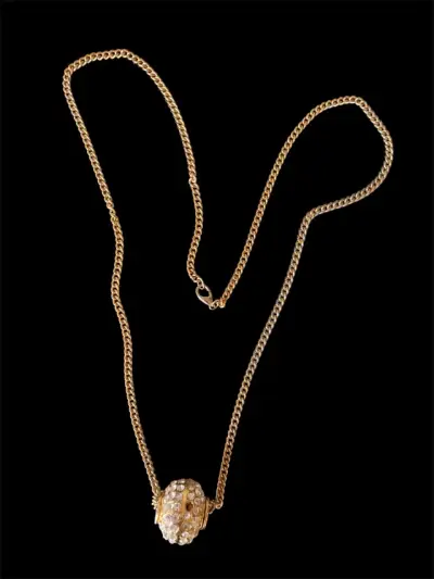 Collar dorado con dije de cristal - miniatura 2