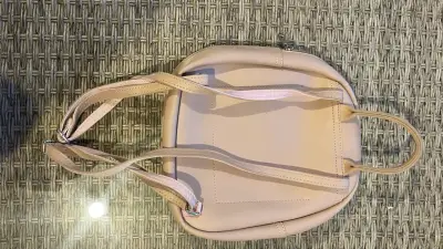 Mochila pequeña rosada palo con cinta decorativa - miniatura 2