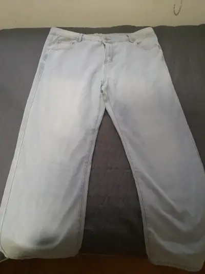 Jeans azul claro para hombre en buen estado - miniatura 1