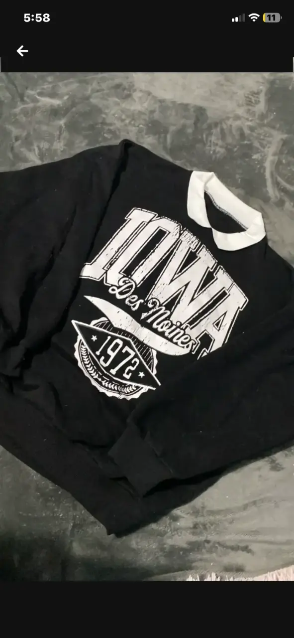 Polerón negro con estampado Iowa 1972