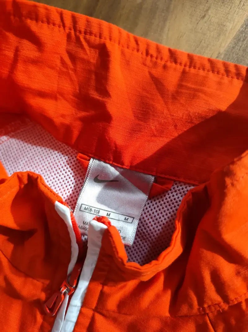 Cortavientos Nike naranja y gris unisex - 3