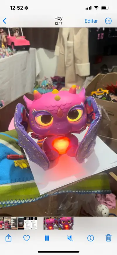 Juguete interactivo dragón rosa con luces - miniatura 1