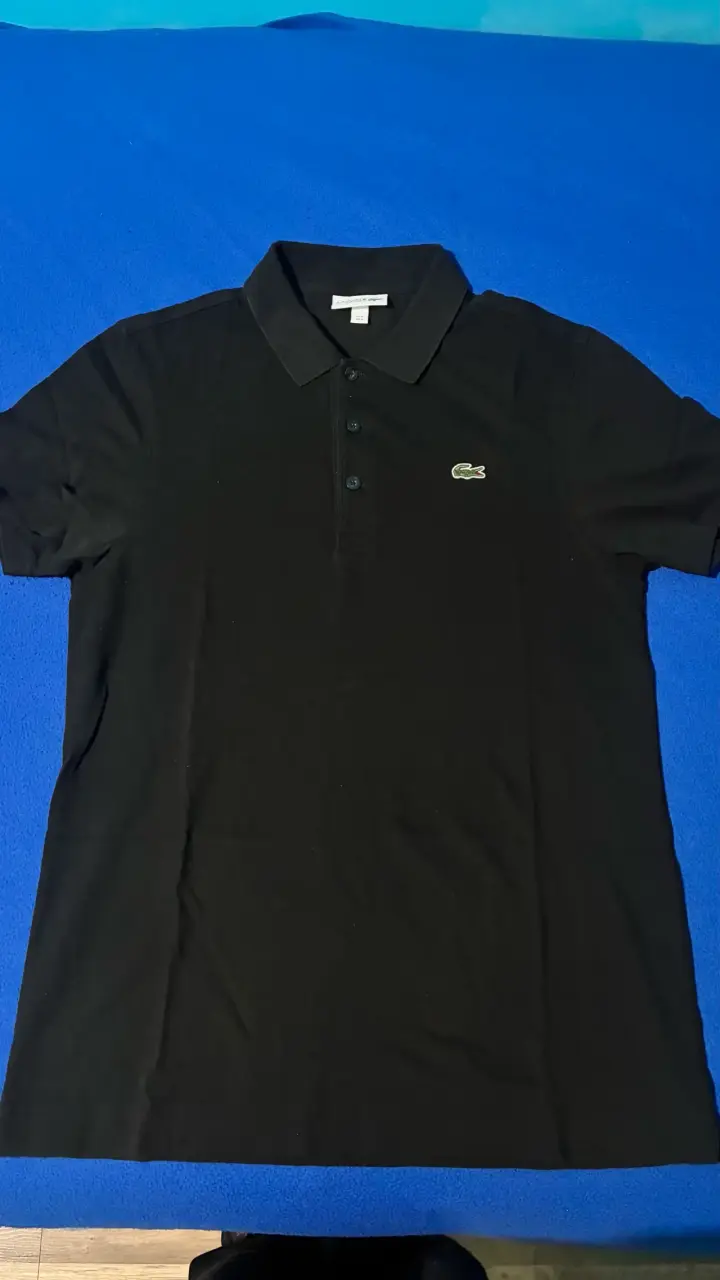 Polera polo negra Lacoste para hombre - 1