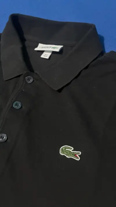 Polera polo negra Lacoste para hombre - miniatura 3