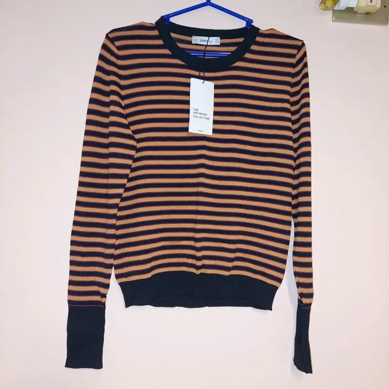 Suéter a rayas Zara en tonos marrón y negro - 1