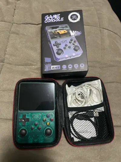 Consola de juegos portátil R36S transparente - miniatura 2