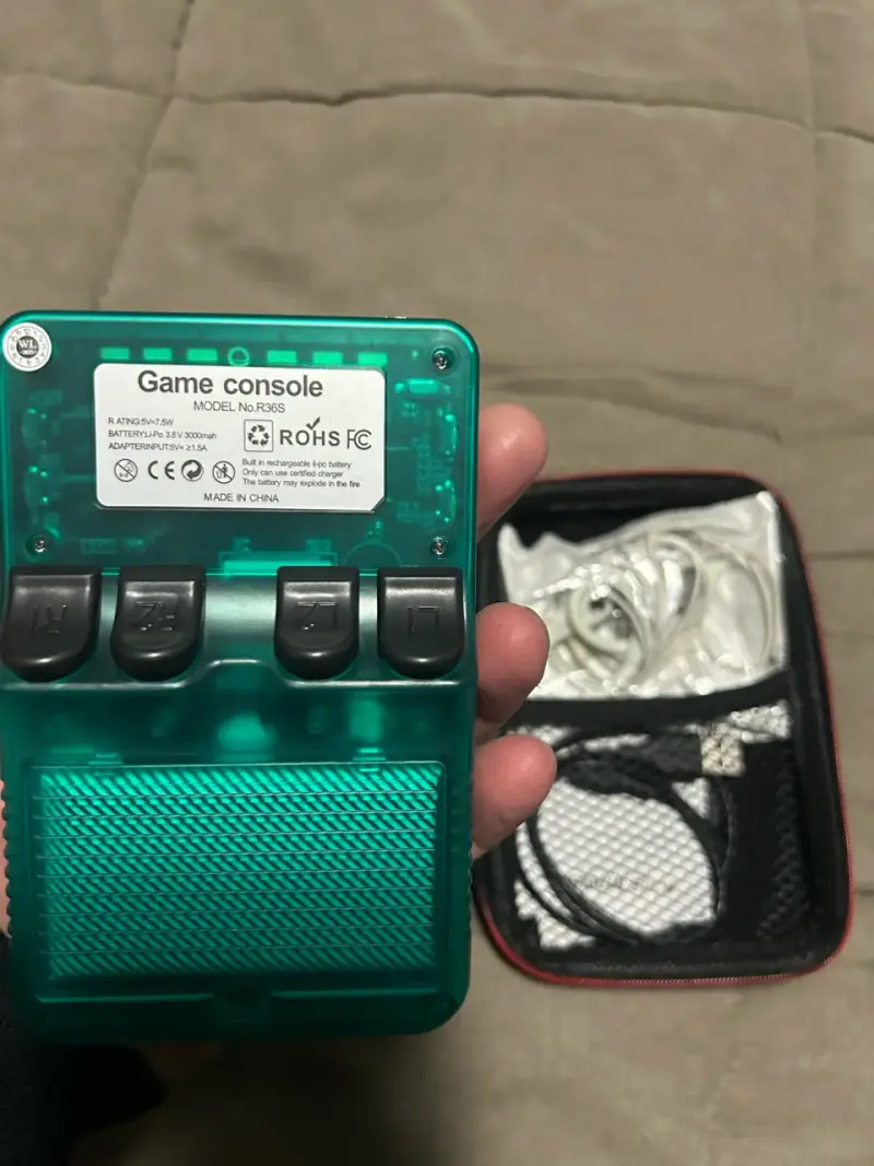 Consola de juegos portátil R36S transparente - 3