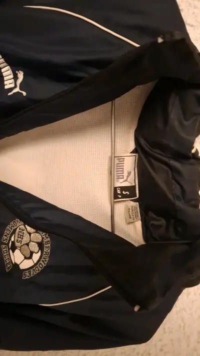 Chaqueta deportiva Puma negra con capucha - miniatura 3