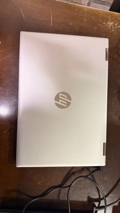 Laptop HP PAVILION X360 plateada en buen estado - miniatura 1