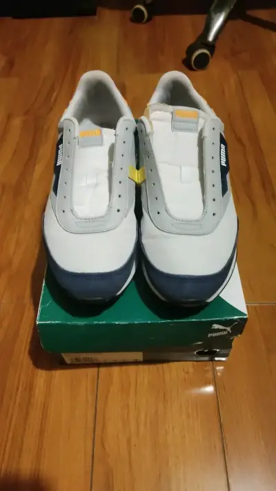 Zapatillas Puma blancas y azules sin cordones - miniatura 1