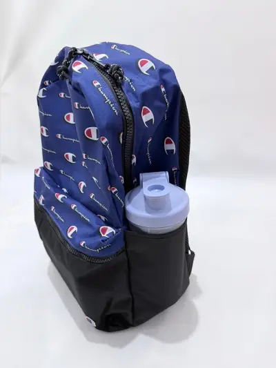 Mochila Champion azul con logo repetido - miniatura 1