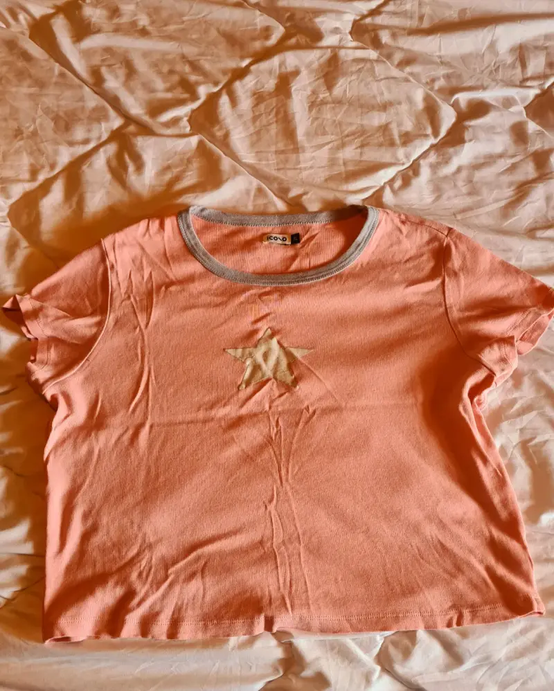 Polera rosa con estrella marca Icono - 1