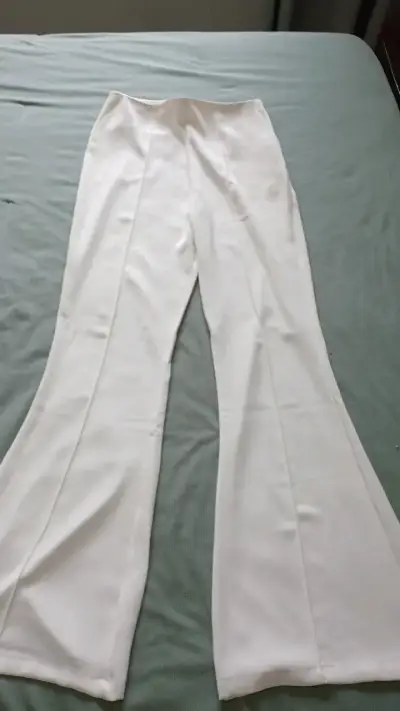 Pantalones blancos elegantes para mujer - miniatura 2