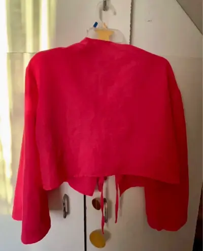 Blusa fuscia con lazo frontal - miniatura 2