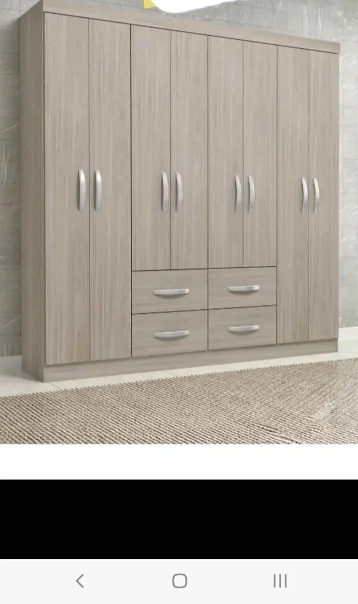 Armario ropero de madera con múltiples puertas - 4