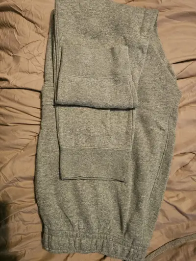 Pantalones deportivos Nike grises con bolsillo - miniatura 4
