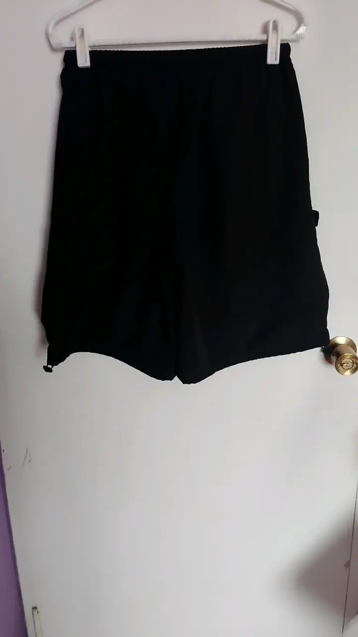 Shorts deportivos negros oversize - 1