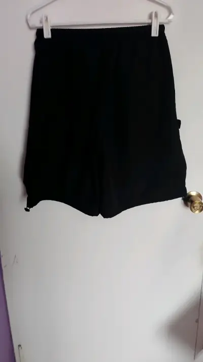 Shorts deportivos negros oversize - miniatura 1