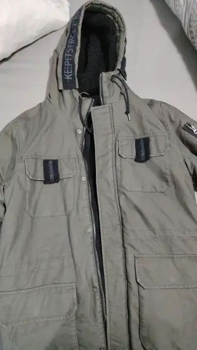 Parka verde con capucha y forro térmico - miniatura 1