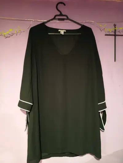 Blusa larga con detalles en mangas - miniatura 1