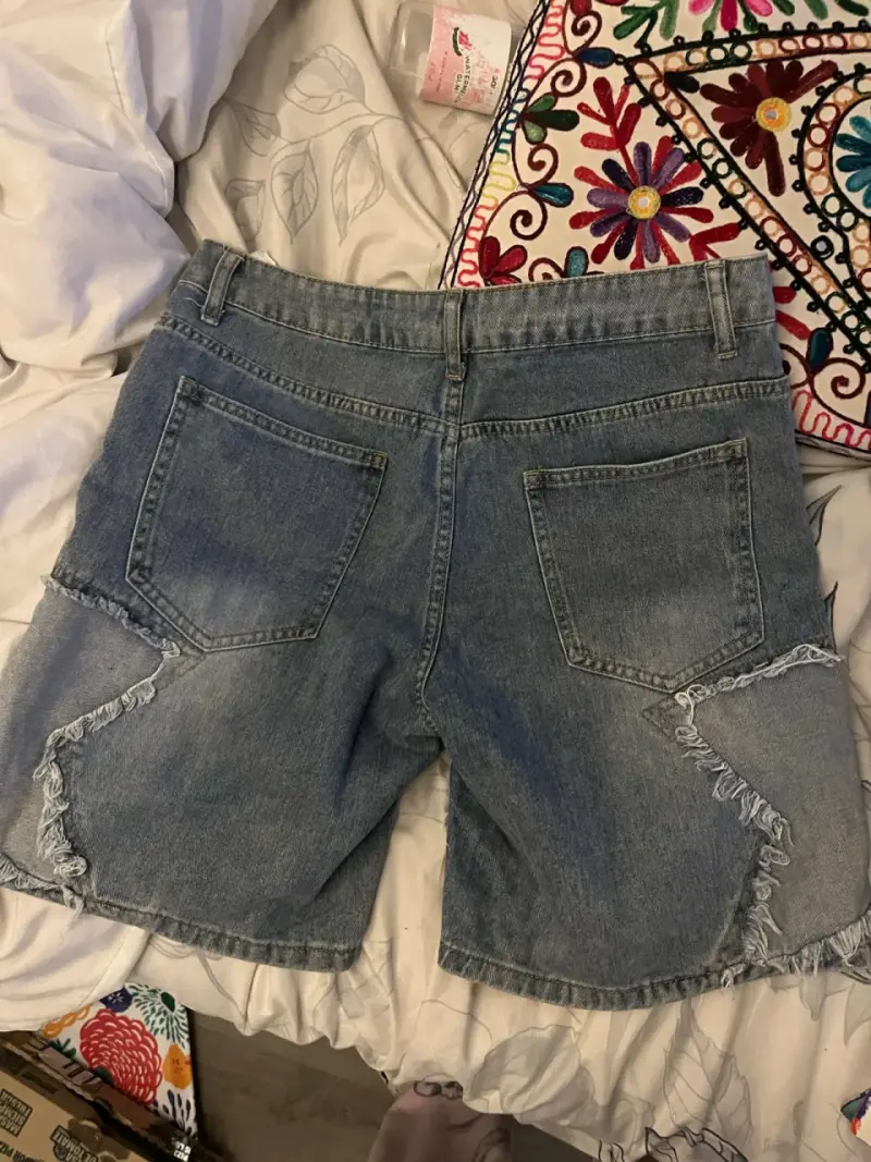 Shorts de mezclilla con diseño desgastado - 4