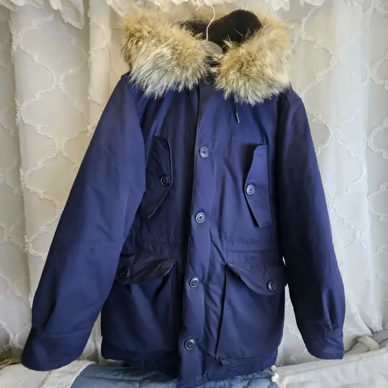 Parka azul con capucha de piel sintética - 1