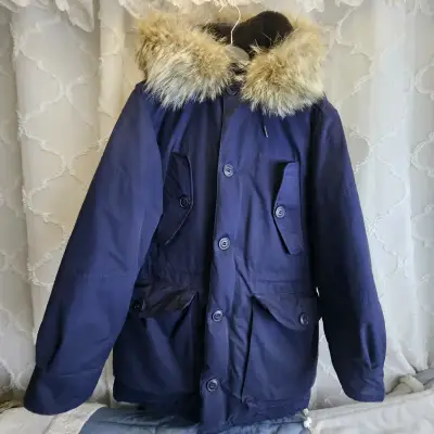 Parka azul con capucha de piel sintética - miniatura 1