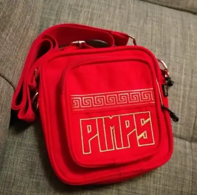 Bandolera roja de tela con diseño moderno - miniatura 1