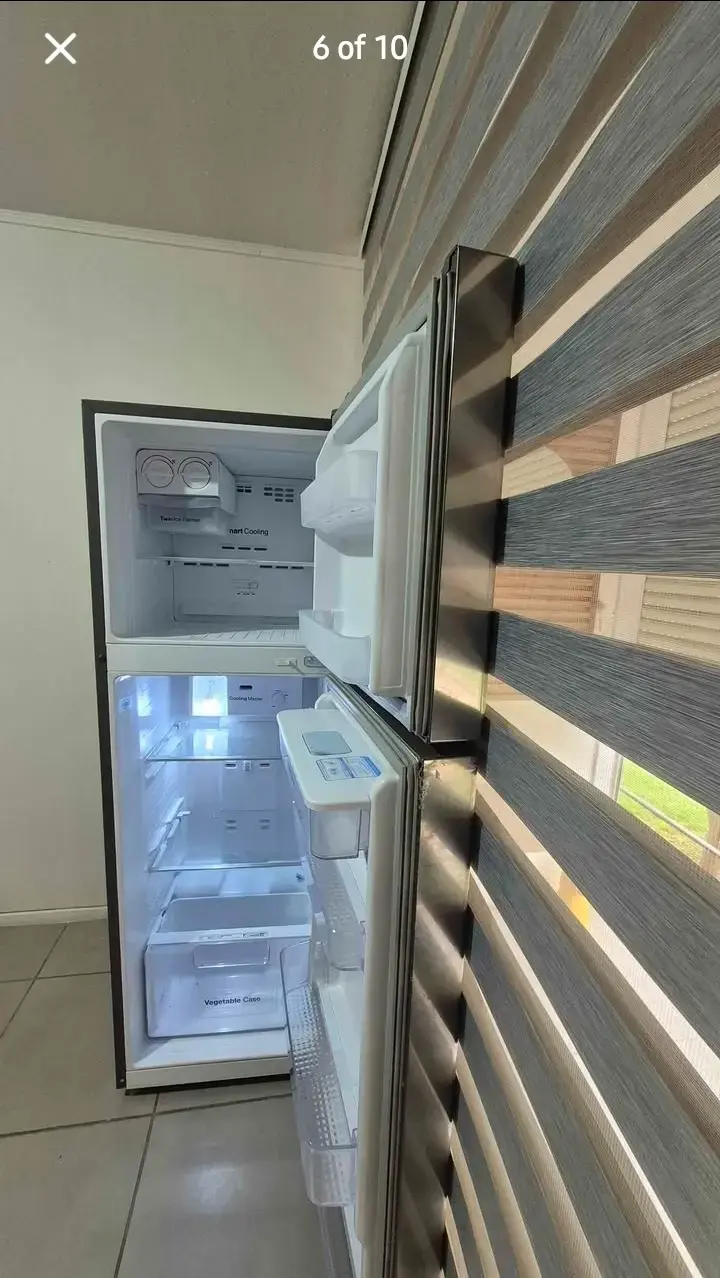 Refrigerador Samsung con dispensador de agua - 6