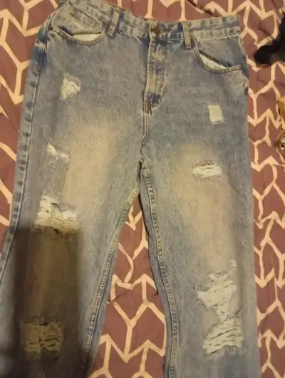 Jeans desgastados de mezclilla azul - miniatura 1