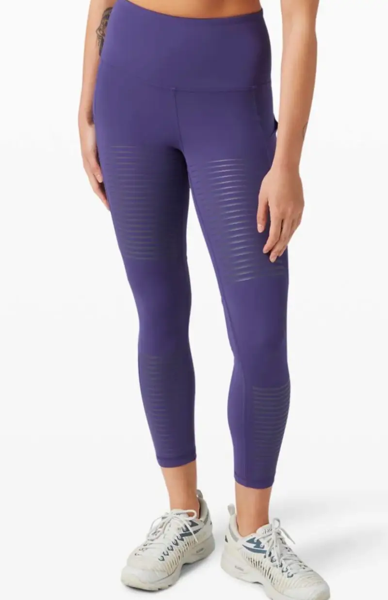 Leggings deportivos morados con diseño texturizado - 1