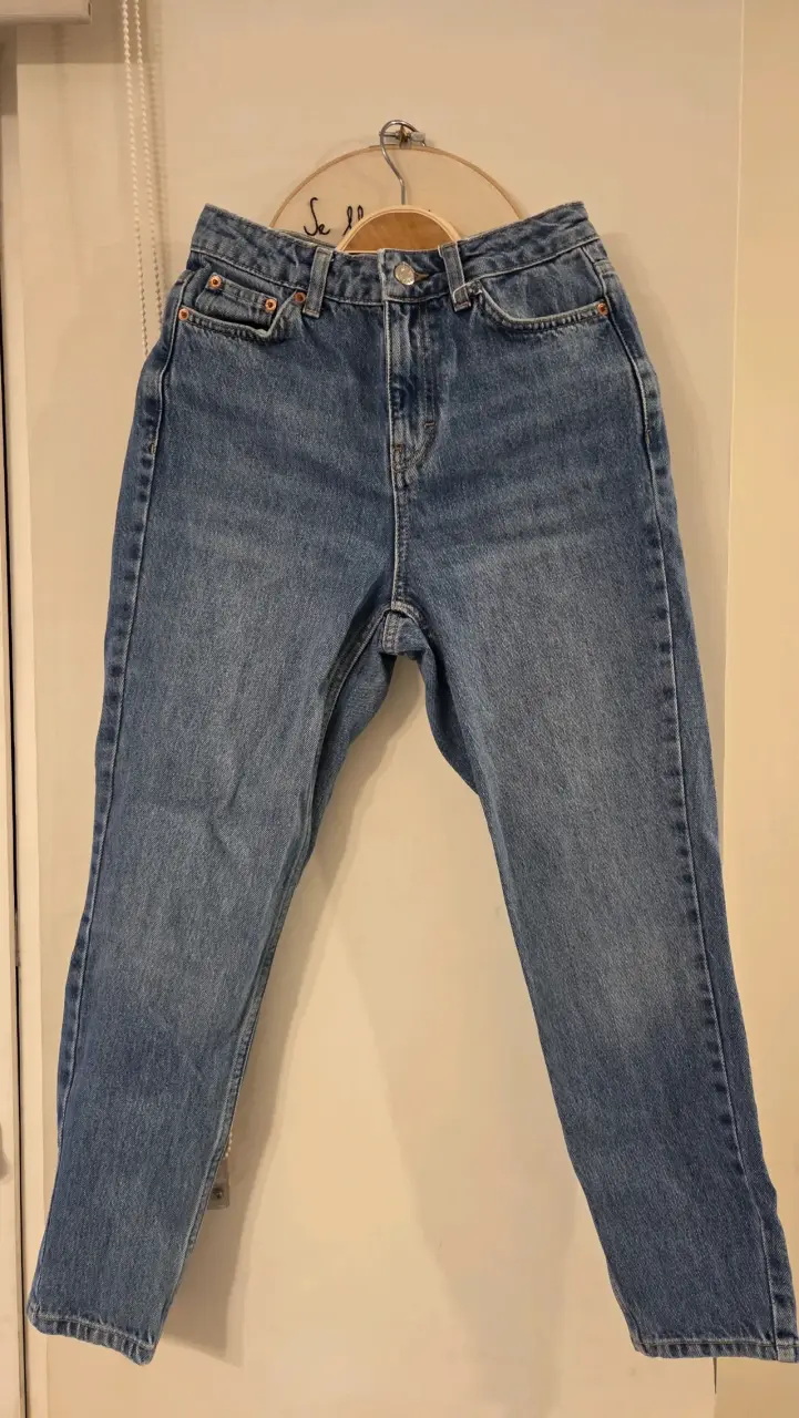 Jeans clásicos de mezclilla azul - 1