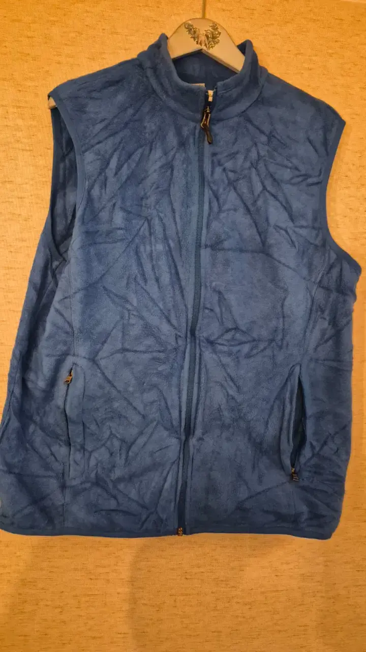Chaleco polar azul sin mangas