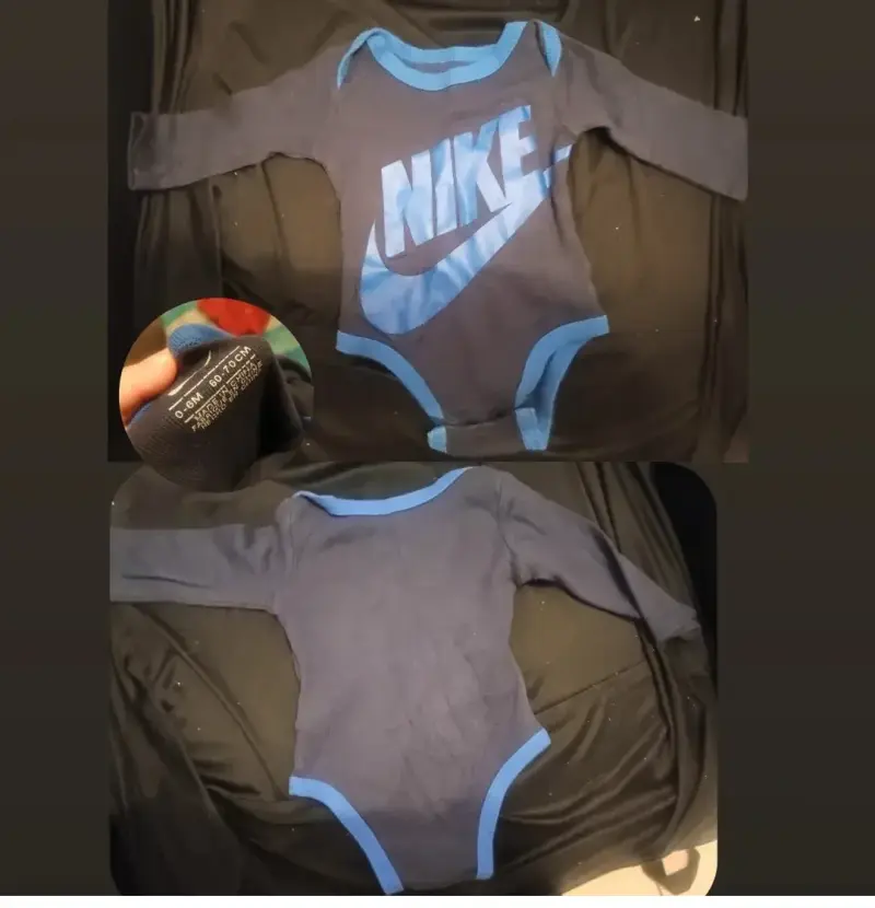 Body de bebé Nike azul con logo