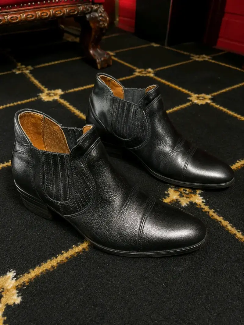 Botines de cuero negro para hombre