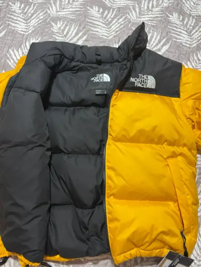Chaqueta The North Face amarilla y negra - miniatura 1
