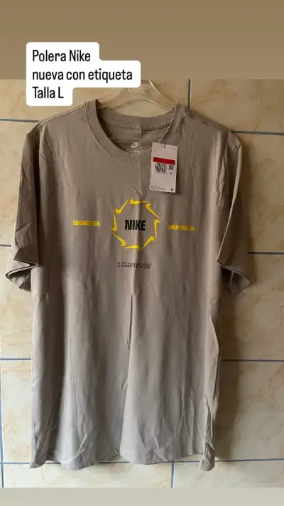 Polera Nike nueva con etiqueta talla L - miniatura 1