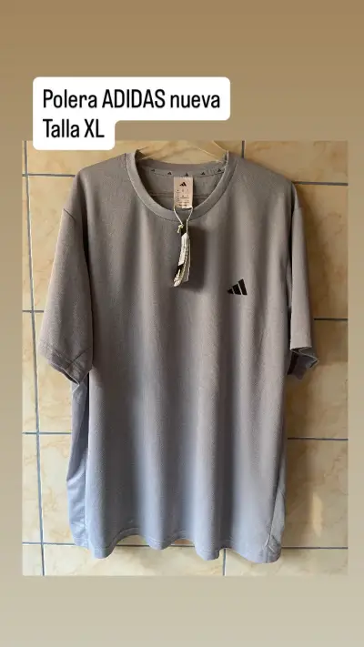 Polera Adidas gris nueva talla XL - miniatura 1