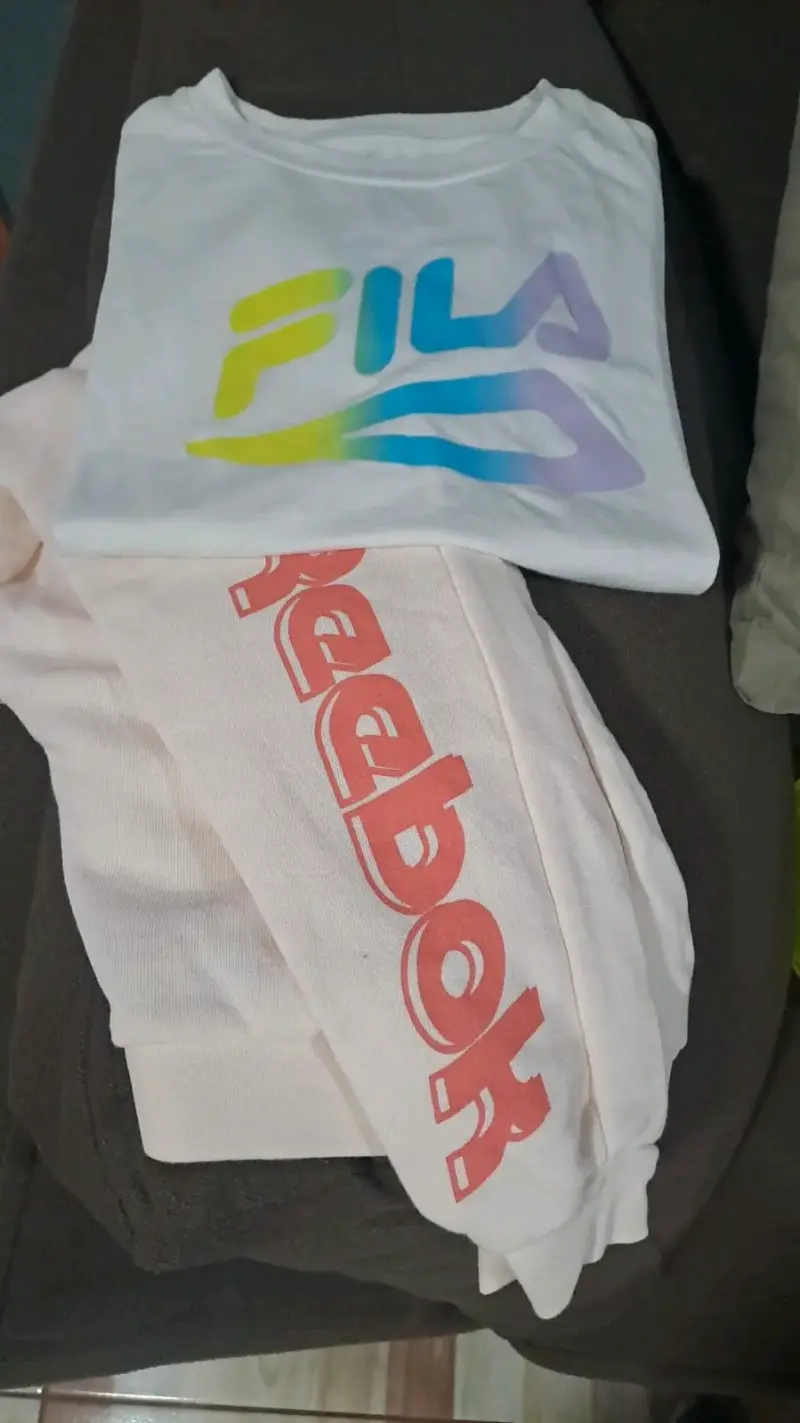 Polera Fila y pantalón Reebok unisex