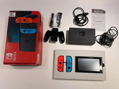 Consola Nintendo Switch con Joy-Con rojo y azul - miniatura 2