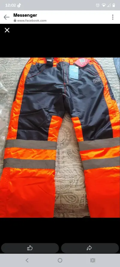 Pantalones de trabajo reflectantes naranja y negro - miniatura 1