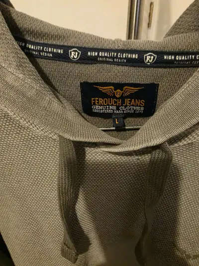 Polerón gris con capucha marca ferouch - miniatura 2