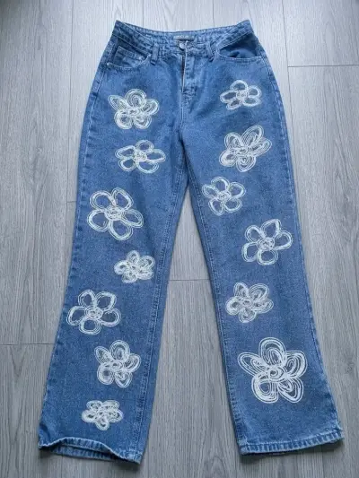 Jeans  con flores para mujer - miniatura 1