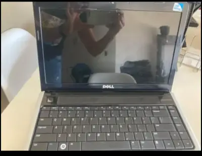 Laptop Dell Inspiron 1440 usada - miniatura 2