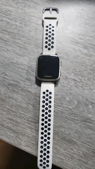 Reloj inteligente Garmin con correa deportiva - miniatura 1
