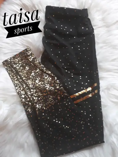 Leggings deportivos negros con brillo dorado s-m - miniatura 1