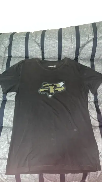 Polera negra Fox Racing con logo camuflado - miniatura 1
