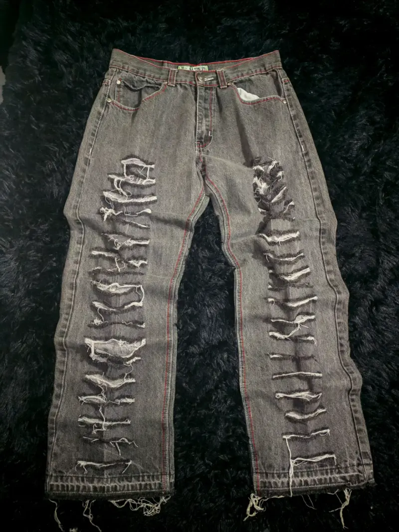 Jeans desgastados de mezclilla gris - 1