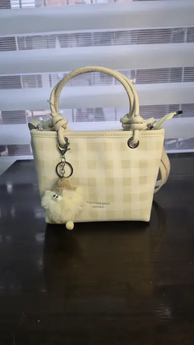 Bolso de mano azul con diseño a cuadros - miniatura 2