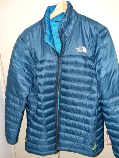 Chaqueta The North Face azul acolchada - miniatura 1